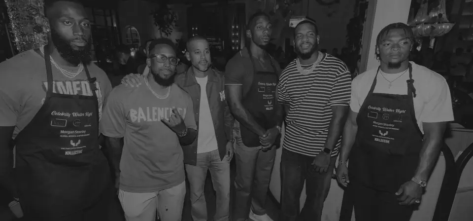 Athletes at Celebrity Waiter Night wearing event aprons
